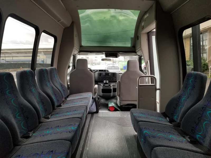 shuttle 3 an inside view of a van with seats